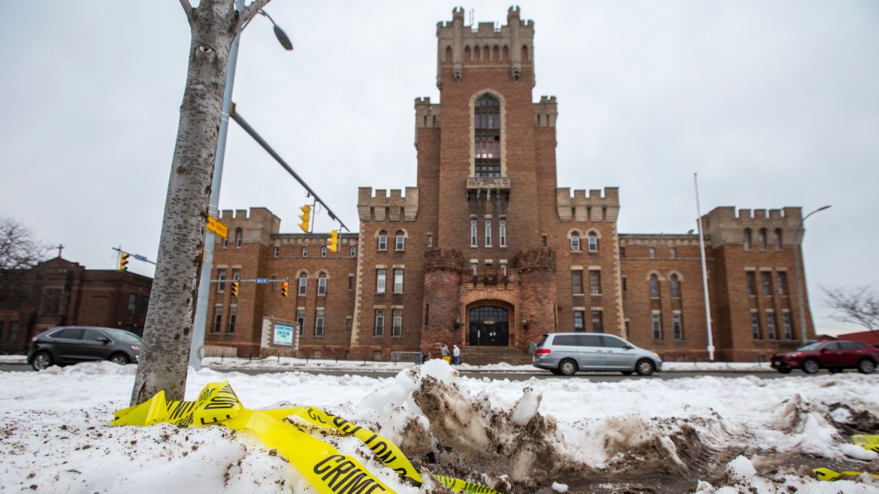 Police tape remains on the ground outside of the Main Street Armory on Monday, March 6, 2023, in Rochester, N.Y. after a deadly stampede happened during a concert. 