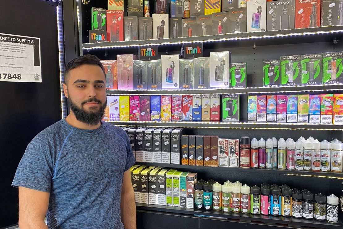 Vape shop operator Ali Ayoub sells an array of colorful vape fluid with candy-like flavors in Brisbane, Australia on May 2, 2023.