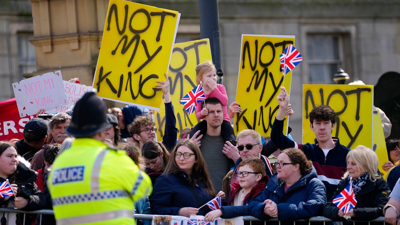 Anti-monarchy protesters wait for the arrival of King Charles III and Queen Camilla in Liverpool last month.