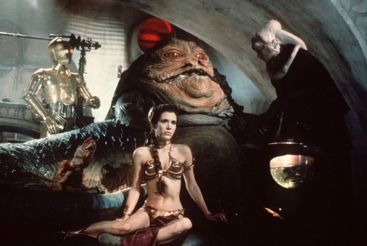 Fisher drew almost as much attention for Princess Leia's hair and wardrobe as she did for her performances in the movies. In 1983's "Return of the Jedi," Leia wore her brown hair in two enormous swirly buns over her ears, and she donned a revealing metal bikini as Jabba the Hutt's captive.