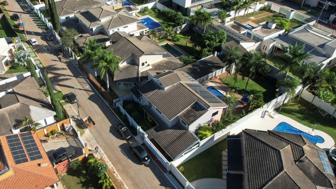 Cars of Brazilian federal police are seen in front of the house of former Brazilian President Jair Bolsonaro on May 3, 2023.