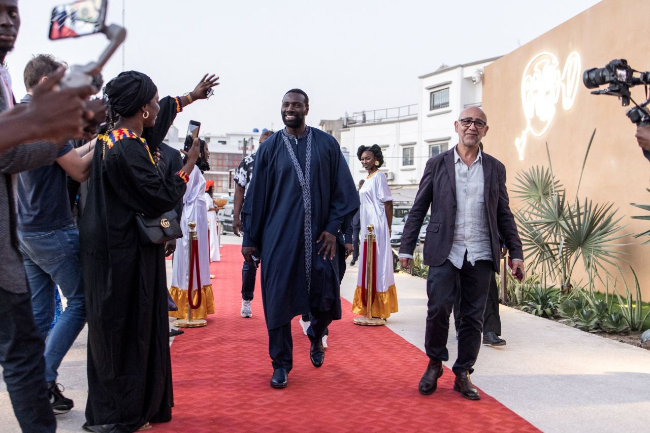 French producer and actor Omar Sy and French director Mathieu Vadepied attend the Senegalese premiere of their film "Tirailleurs" in Dakar, December 2022. The Pathé cinema is one of a number of recent new venues in the capital.