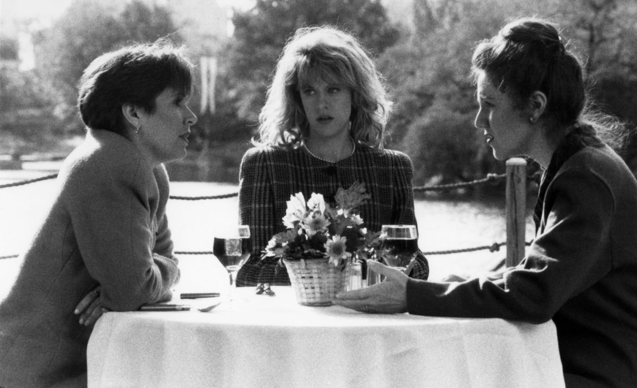 From left, Fisher, Meg Ryan and Lisa Jane Persky star in the film "When Harry Met Sally..." in 1989.