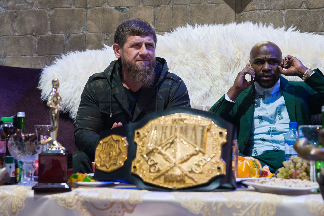 Kadyrov sits with Mayweather Jr..