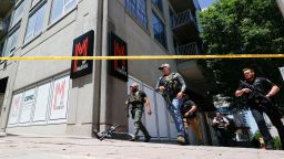 Law enforcement officers arrive near the scene of an active shooter on Wednesday, May 3, 2023 in Atlanta. Atlanta police said there had been no additional shots fired since the initial shooting unfolded inside a building in a commercial area with many office towers and high-rise apartments.  (AP Photo/Alex Slitz)