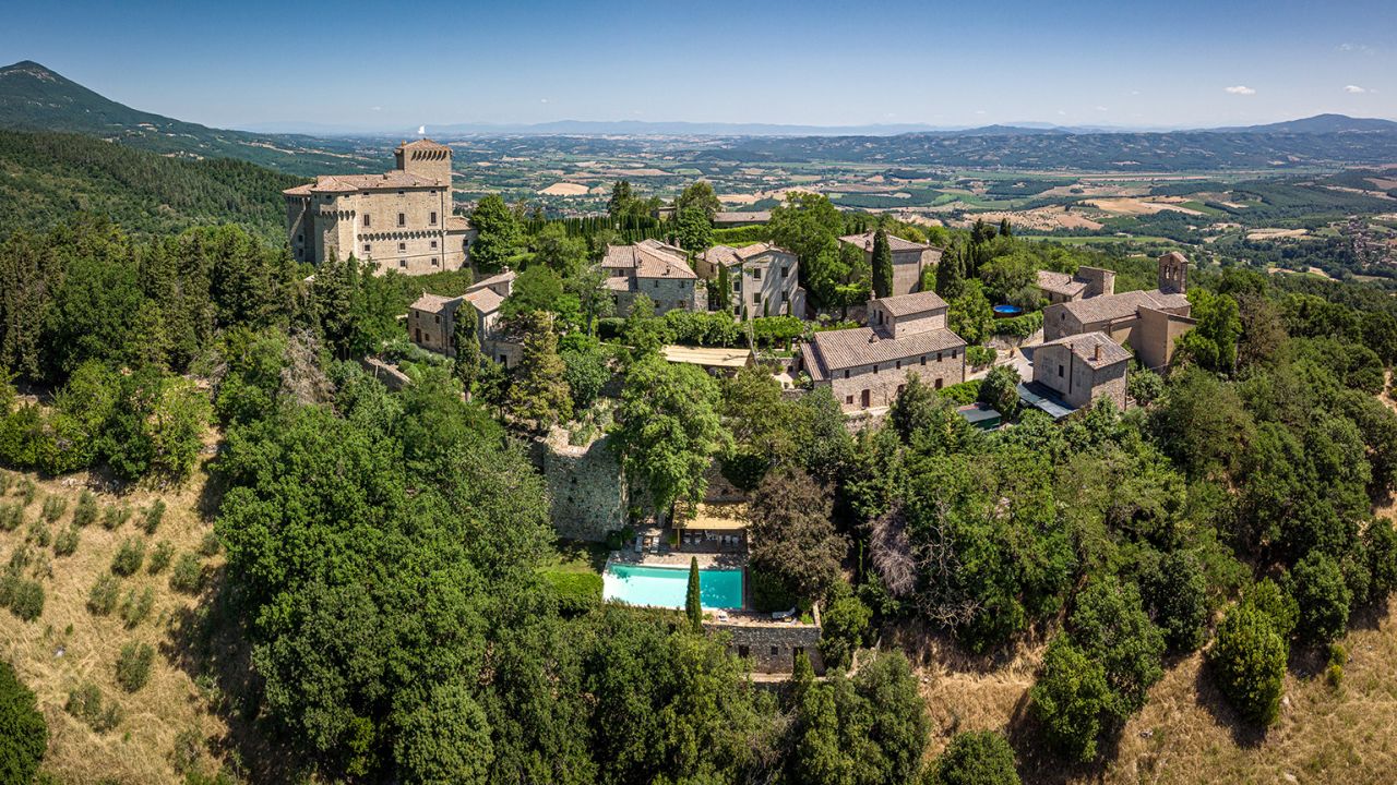 Max and Joy Ulfane spent years renovating neglected Tuscan fortress Castello di Fighine into a luxury retreat.