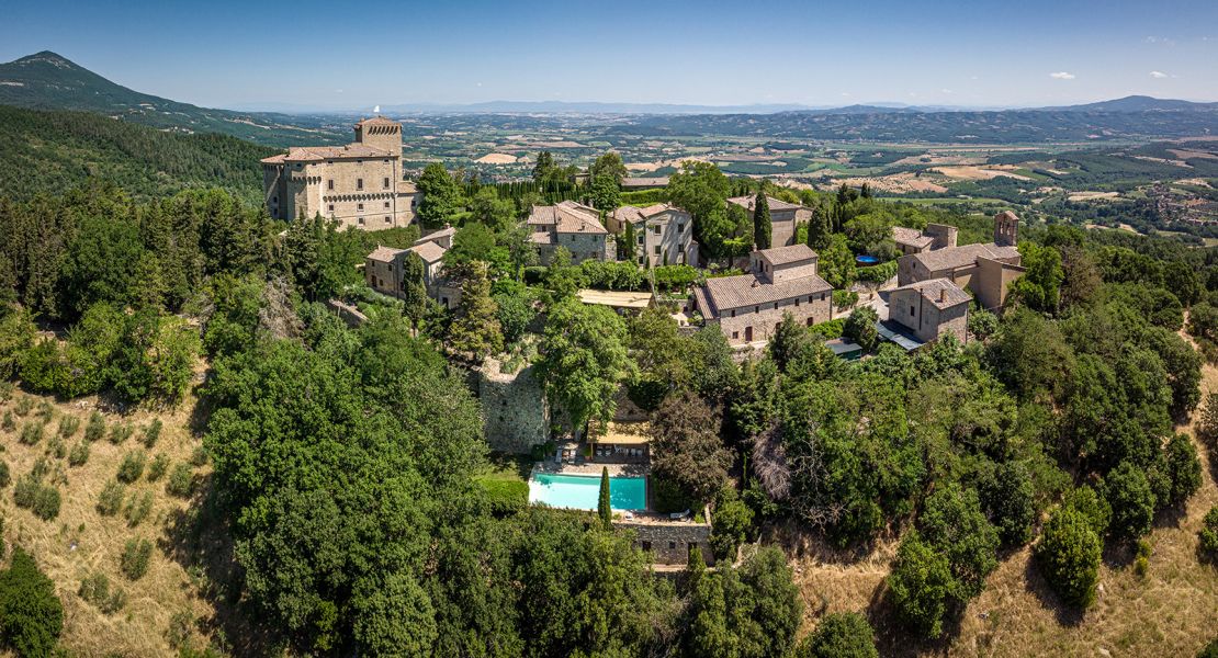 Max and Joy Ulfane spent years renovating neglected Tuscan fortress Castello di Fighine into a luxury retreat.