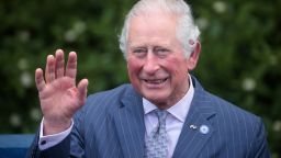 COVENTRY, ENGLAND - MAY 25: Prince Charles, Prince of Wales reacts as he travels on the heritage boat 'Scorpio' on the Coventry Canal on May 25, 2021 in Coventry, England. (Photo by Hannah McKay - WPA Pool/Getty Images)