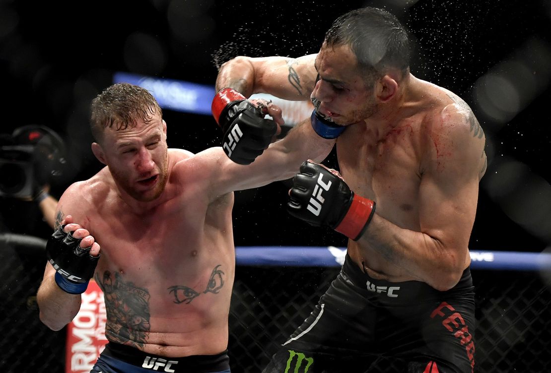 Gaethje (left) punches Tony Ferguson in their Interim lightweight title fight during UFC 249 on May 9, 2020.