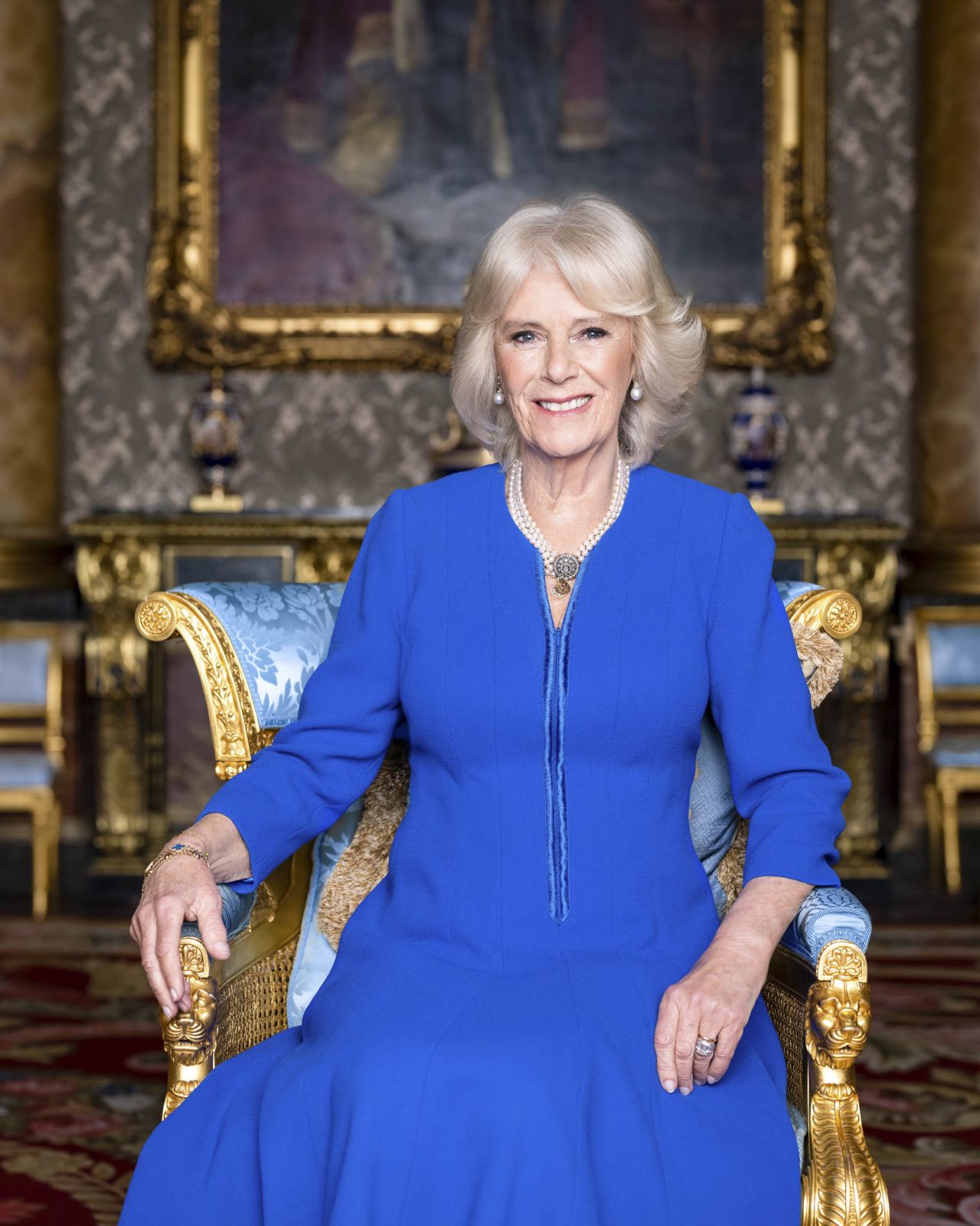 Camilla sits in Buckingham Palace's Blue Drawing Room in March 2023.