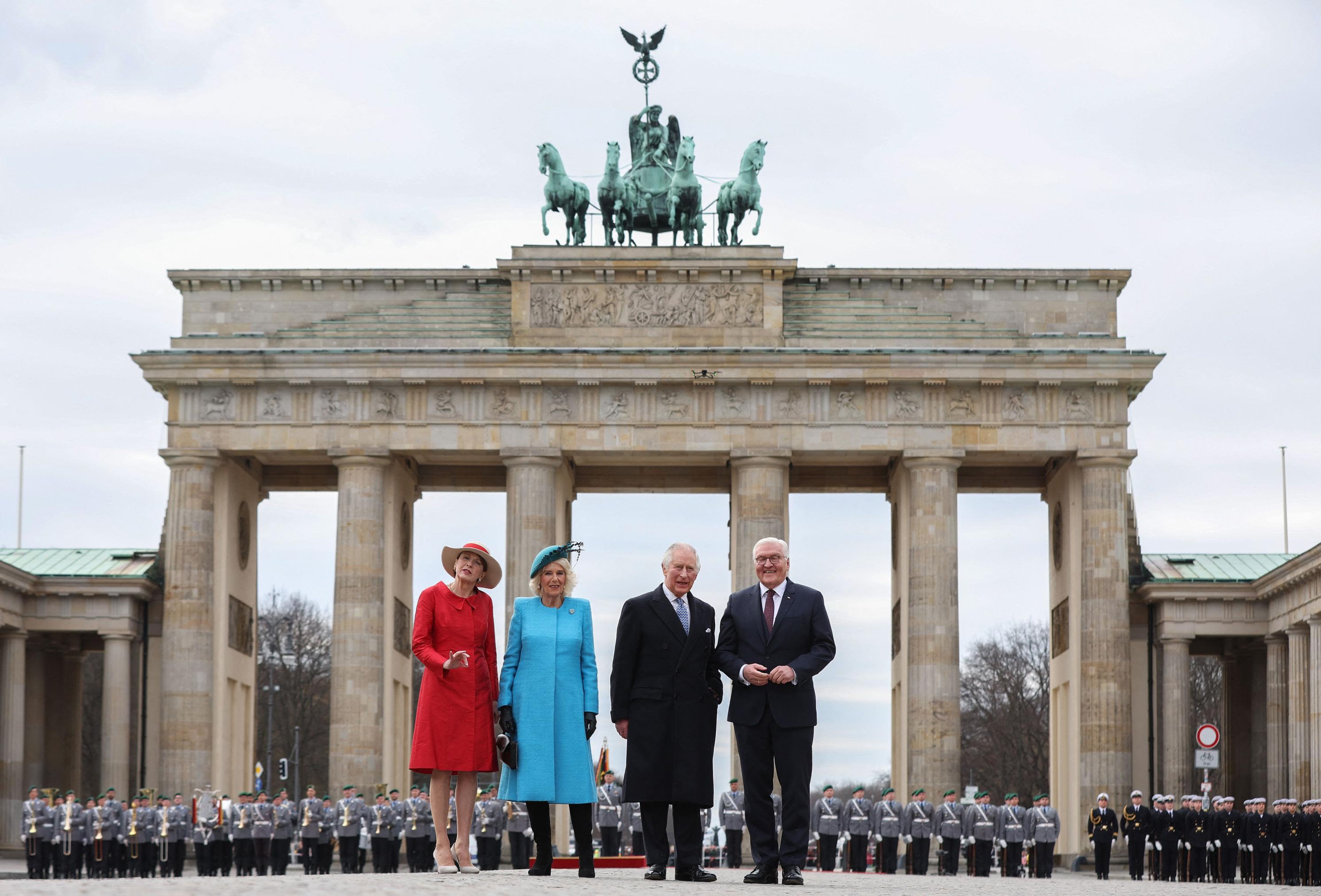 Charles and Camilla are flanked by German President Frank-Walter Steinmeier and his wife, Elke Büdenbender, at Berlin's Brandenburg Gate in March 2023.