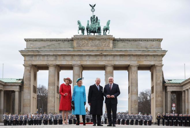 Charles and Camilla are flanked by German President Frank-Walter Steinmeier and his wife, Elke Büdenbender, at Berlin's Brandenburg Gate in March 2023. The King spent three days in Germany for what was <a href="index.php?page=&url=https%3A%2F%2Fwww.cnn.com%2F2023%2F03%2F29%2Feurope%2Fgallery%2Fking-charles-visits-germany%2Findex.html" target="_blank">his first overseas state visit as monarch</a>.