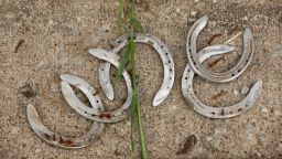 LOUISVILLE, KENTUCKY - APRIL 29: Discarded horse shoes in the barn area during the morning training for the Kentucky Derby at Churchill Downs on April 29, 2023 in Louisville, Kentucky. (Photo by Andy Lyons/Getty Images)