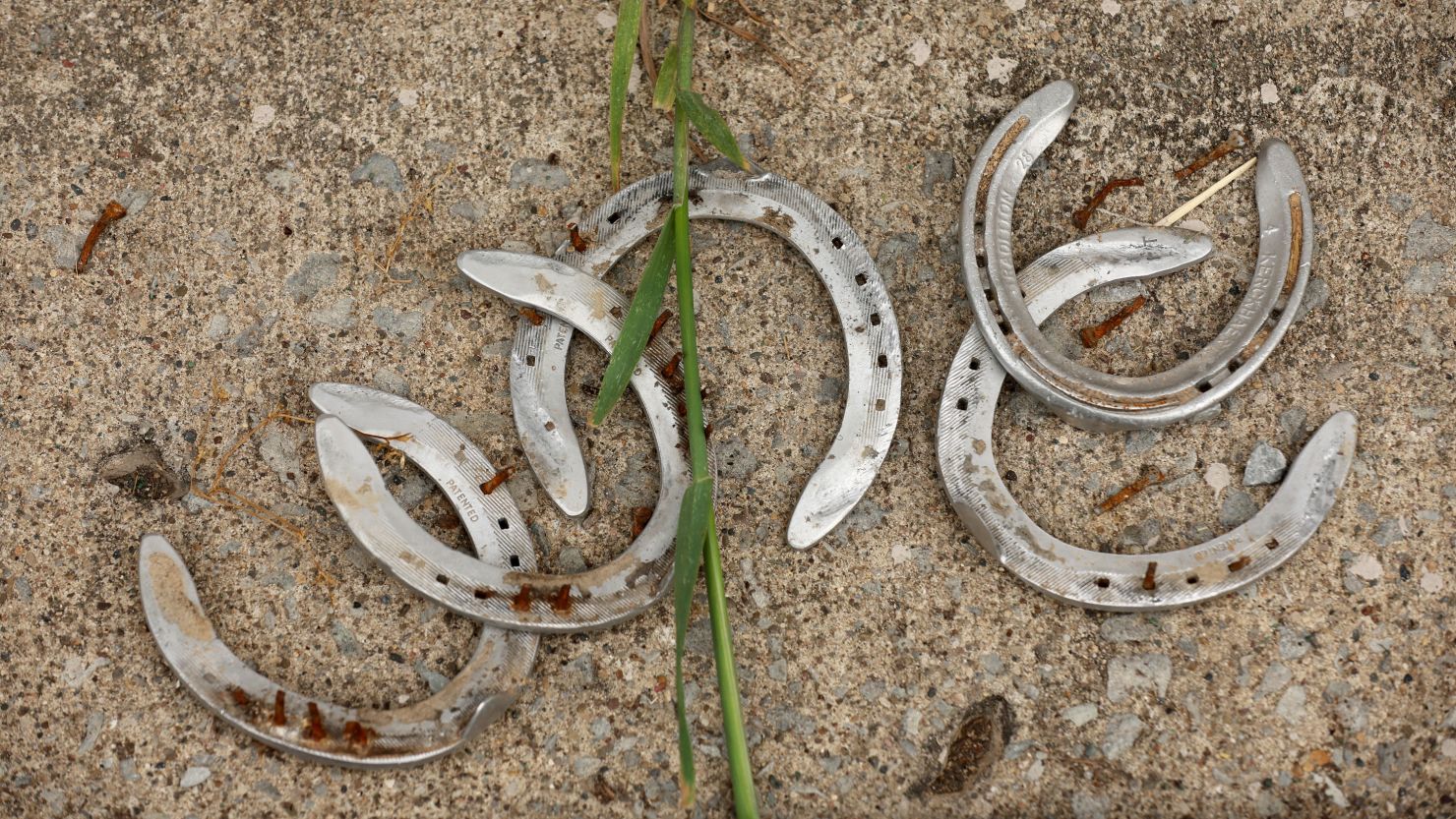 Discarded horse shoes are seen in the barn area during the morning training for the Kentucky Derby at Churchill Downs on April 29, 2023. 