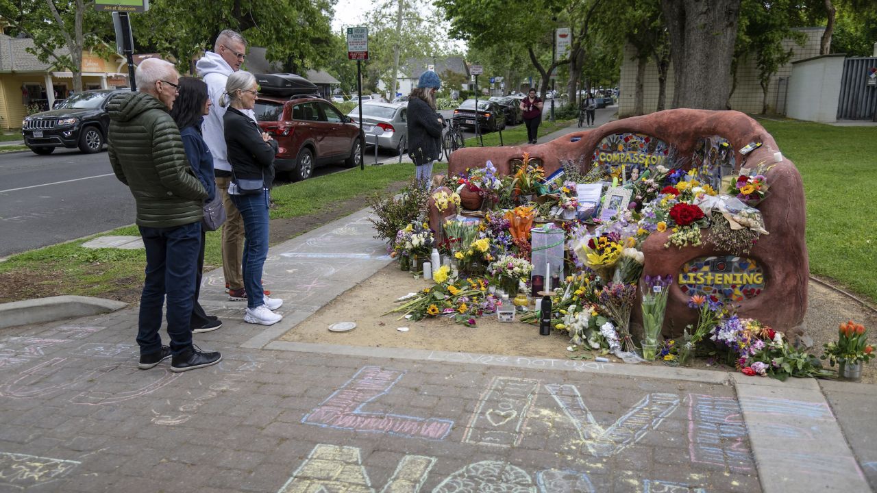 People view a memorial set up in Davis, Calif., on Monday, May 1, 2023, to honor David Henry Breaux, one of three people who were stabbed within a week in the California university town. 
