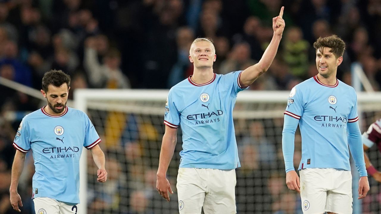 Manchester City's Erling Haaland, centre, celebrates after scoring his side's second goal during the English Premier League soccer match between Manchester City and West Ham United at Etihad stadium in Manchester, England, Wednesday, May 3, 2023. 