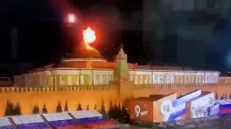 A still image taken from video shows a flying object exploding in an intense burst of light near the dome of the Kremlin Senate building during the alleged Ukrainian drone attack in Moscow, Russia, in this image taken from video obtained by Reuters May 3, 2023.