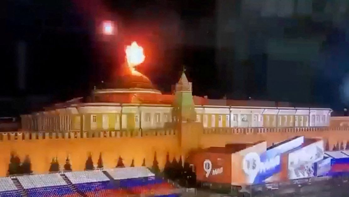 A still image shows a flying object exploding in an intense burst of light near the dome of the Kremlin Senate building earlier this month.