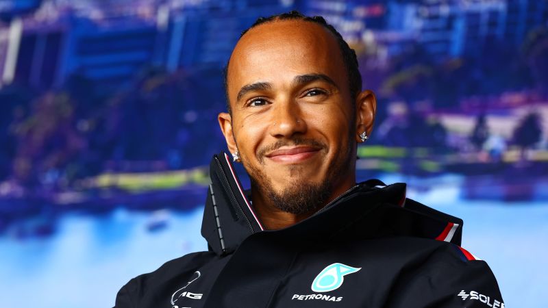 NextImg:From serving drinks to washing cars: Lewis Hamilton on what helped make him a sporting great | CNN
