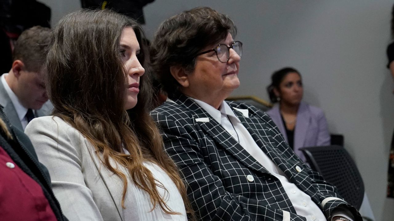 Lea Glossip, left, wife of death row inmate Richard Glossip, listens with death penalty opponent Sister Helen Prejean, right, during a news conference on Thursday, May 4, in Oklahoma City.