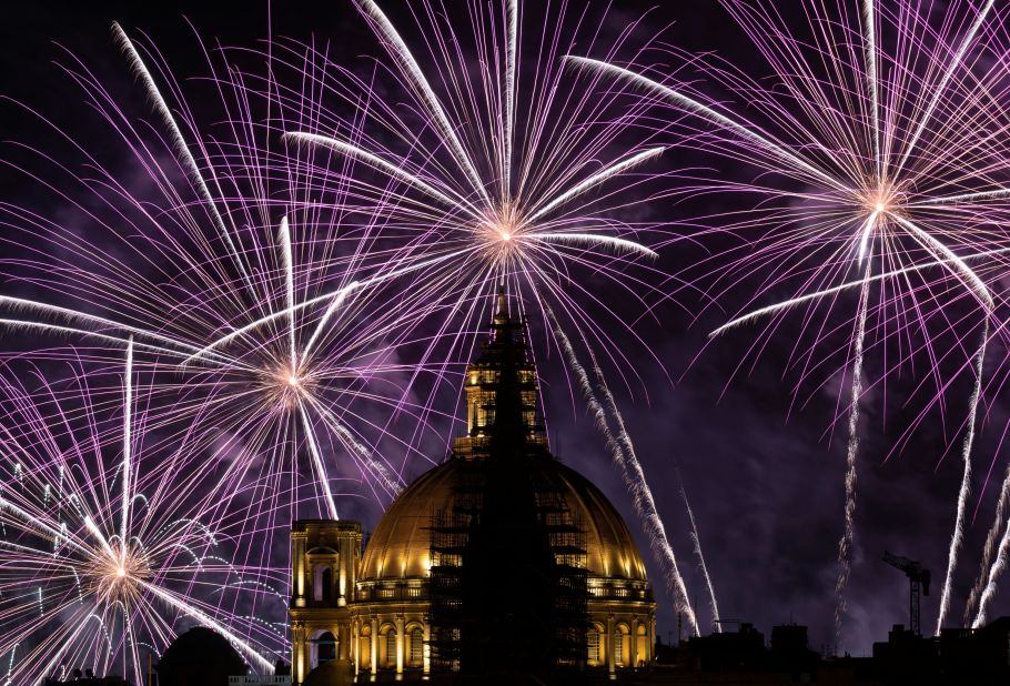 Fireworks explode behind the steeple of the St. Paul's Pro-Cathedral in Valletta, Malta, on Sunday, April 30. It was part of the Malta International Fireworks Festival.
