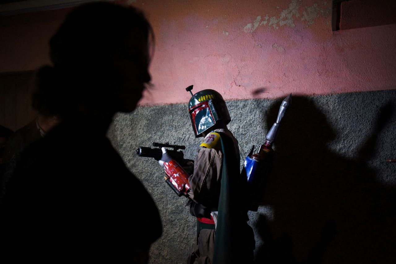 A person dressed in a Boba Fett costume prepares for a "Star Wars" event in La Paz, Bolivia, on Wednesday, May 3. <a href="https://www.cnn.com/2023/05/04/entertainment/may-4-star-wars-day/index.html" target="_blank">"Star Wars Day"</a> is celebrated on May 4, a nod to one of the movie's catchphrases: "May the Force be with you."