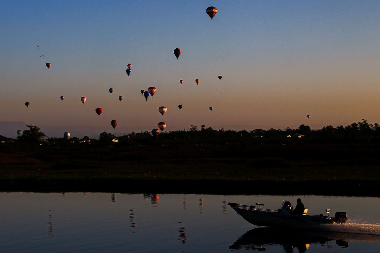 Hot-air balloons fill the sky in Torres, Brazil, during the International Ballooning Festival on Saturday, April 29. <a href=