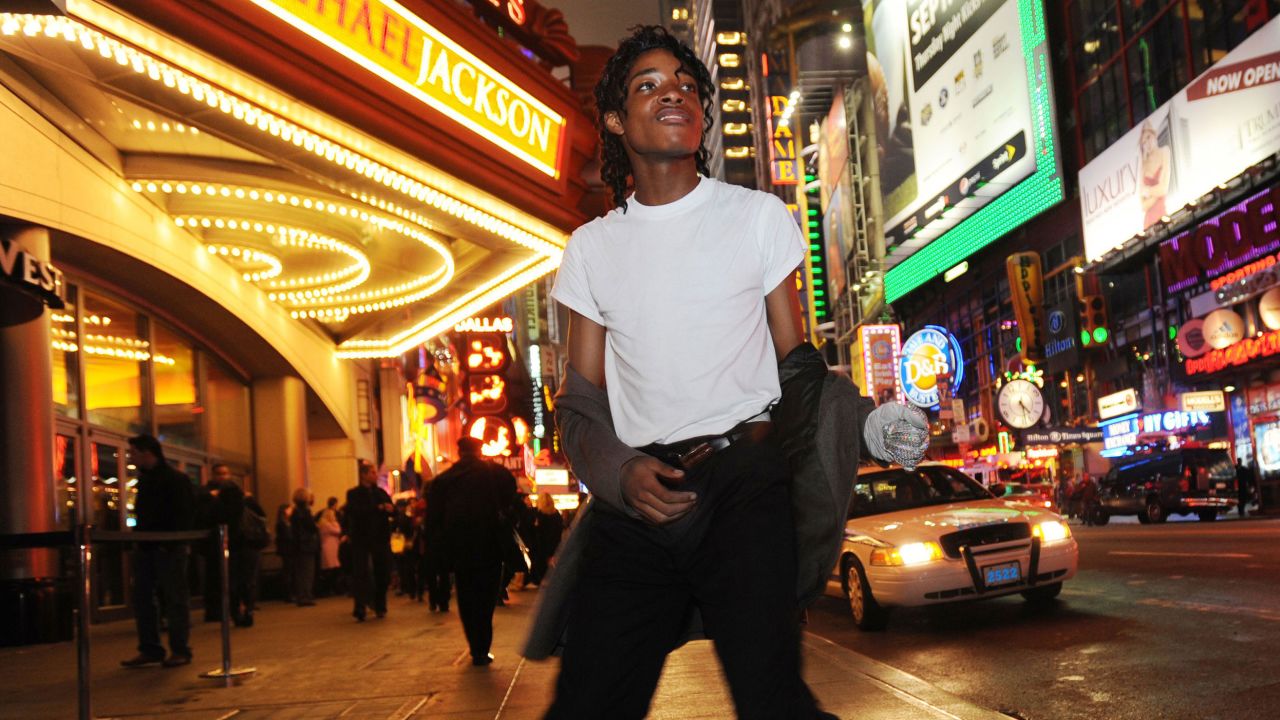 Jordan Neely is pictured before going to see the Michael Jackson movie, "This is It," outside the Regal Cinemas in Times Square in 2009.