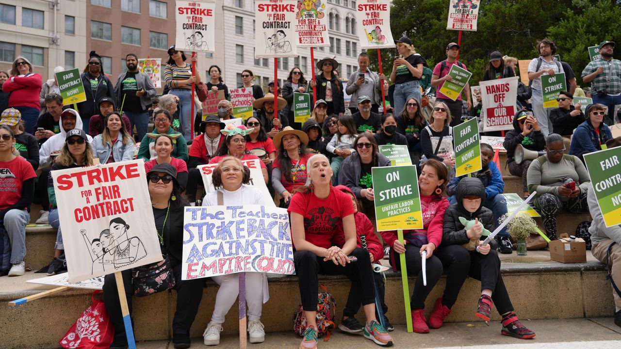Striking teachers hold a rally outside Oakland's City Hall on Thursday. 