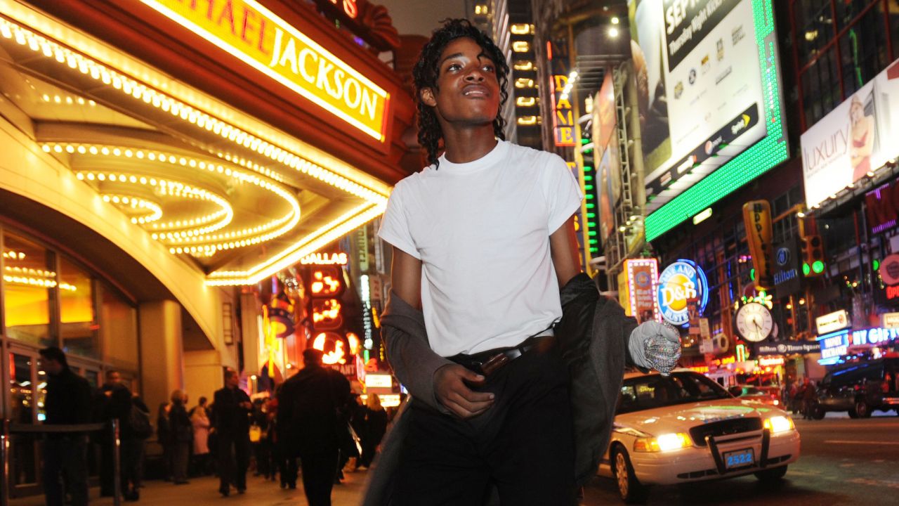 Jordan Neely is pictured before going to see the Michael Jackson movie, "This is It," outside the Regal Cinemas in Times Square in 2009.