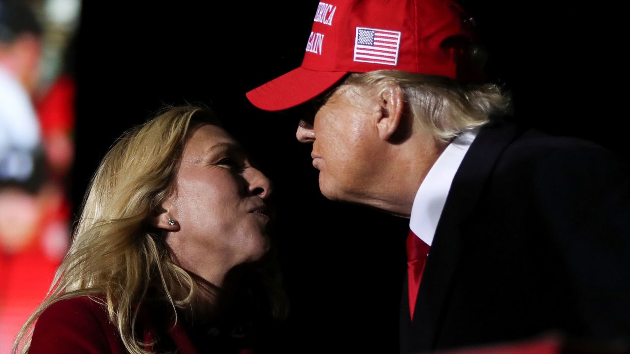 Rep. Marjorie Taylor Greene greets former President Donald Trump during a rally in Commerce, Georgia, in March 2022.