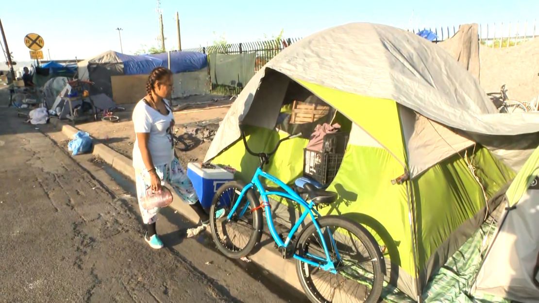 Rayann Denny lives in a tent in a homeless encampment in Phoenix.