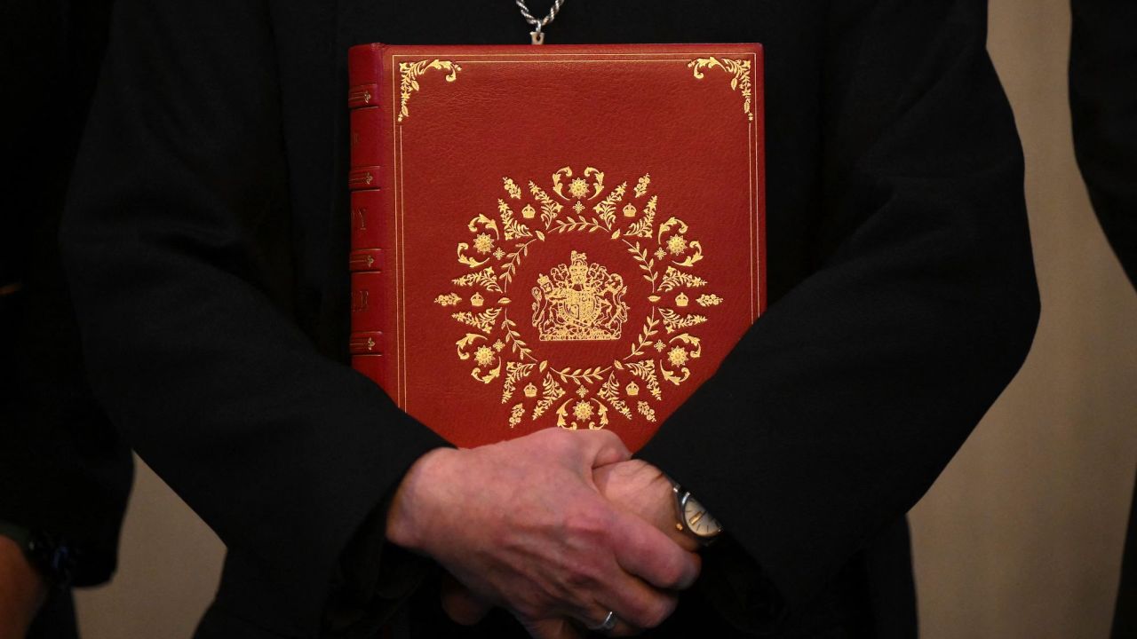 The Archbishop of Canterbury Justin Welby poses with the Coronation Bible, a specially commissioned Bible which will be used during the Coronation Service when The King takes the Coronation Oath, in Lambeth Palace in London on April 20, 2023. - Four copies of the Coronation Bible have been made. Following the Coronation, the Bible used in the service will be kept in the Lambeth Palace Library. Three identical copies have been produced: one will be given to The King as a personal copy, and the other two will be placed in the archives of Westminster Abbey and Oxford University Press respectively. (Photo by Daniel LEAL / AFP) (Photo by DANIEL LEAL/AFP via Getty Images)