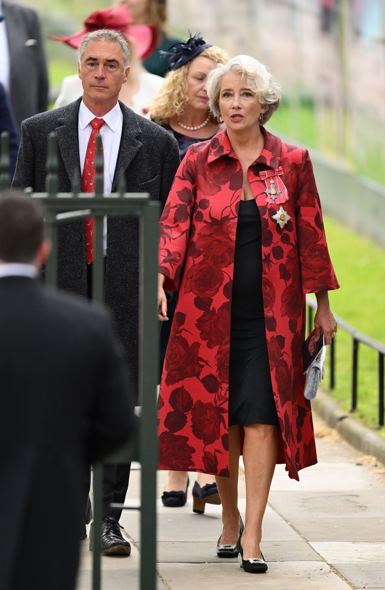 Greg Wise and Emma Thompson arrive at Westminster Abbey for the Coronation of King Charles III and Queen Camilla.