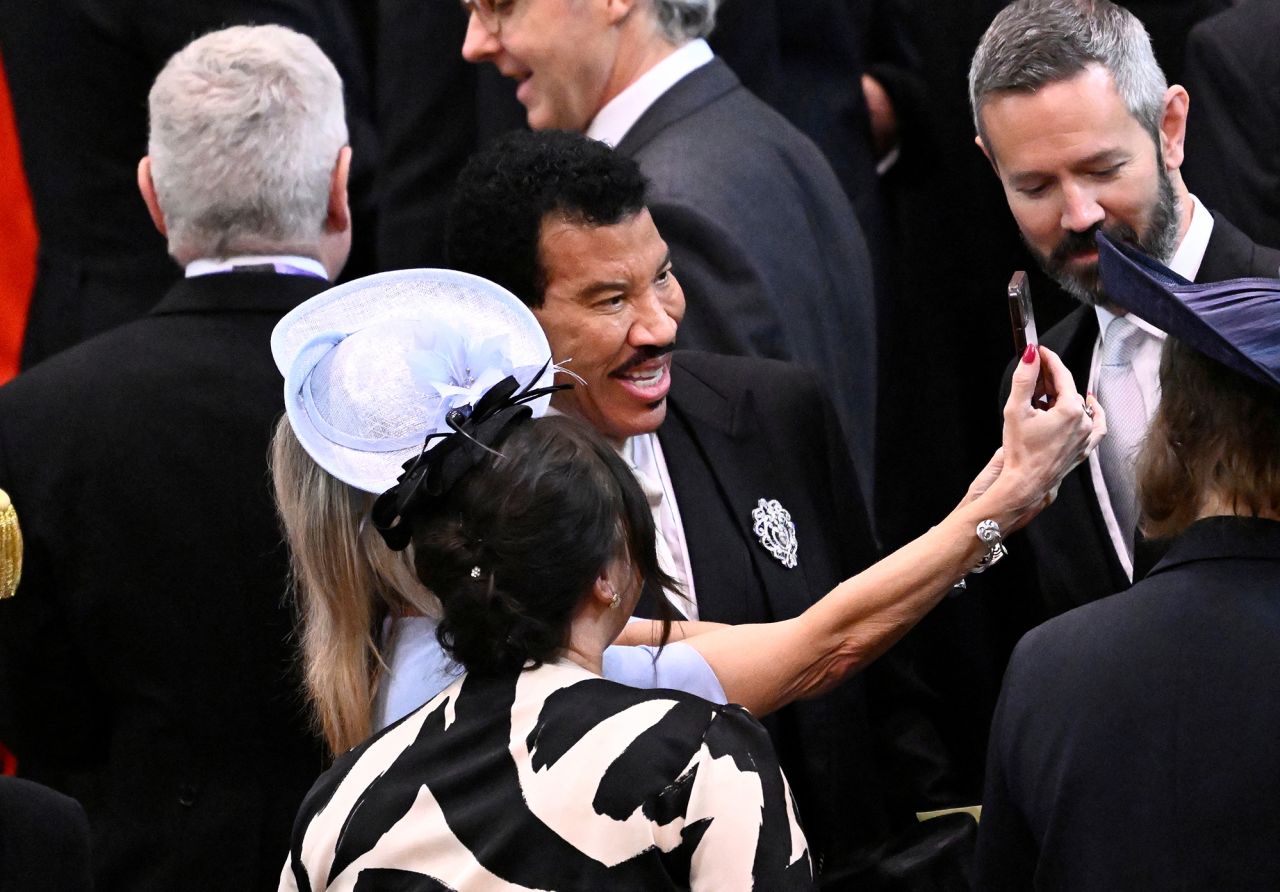 Singer Lionel Richie poses for a selfie at Westminster Abbey.