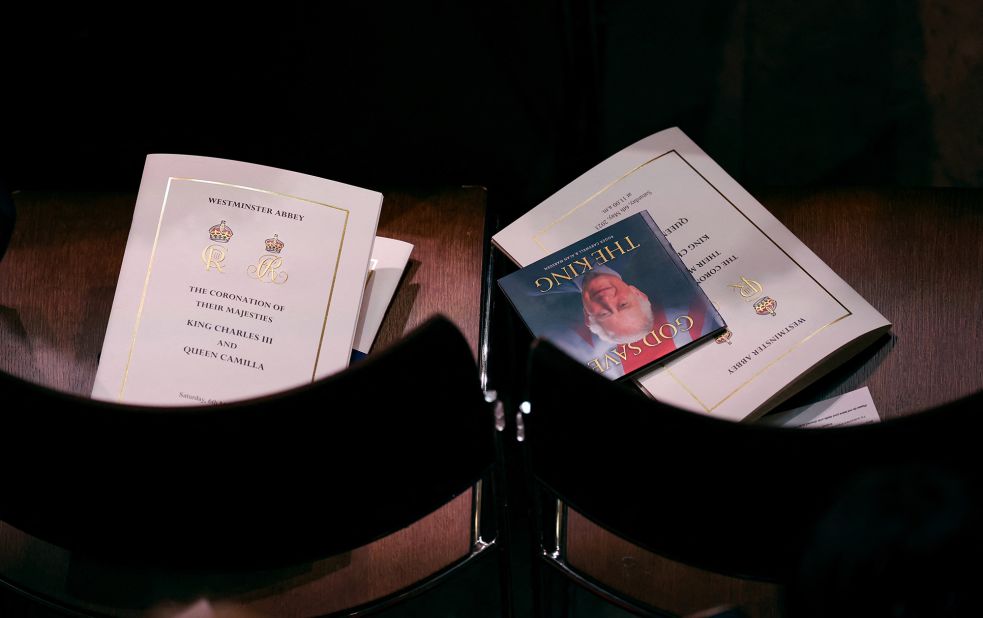 Order-of-service booklets are seen at Westminster Abbey as guests arrive for the coronation.