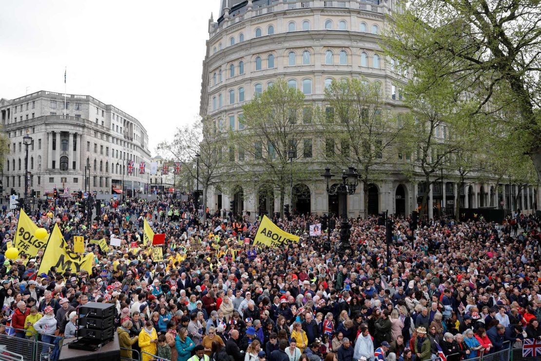 Protesters hold up placards saying "Not My King" and "Abolish the Monarchy" in Trafalgar Square, close to Westminster Abbey in central London on May 6, 2023.