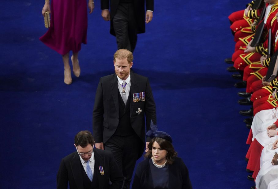 Prince Harry enters Westminster Abbey.