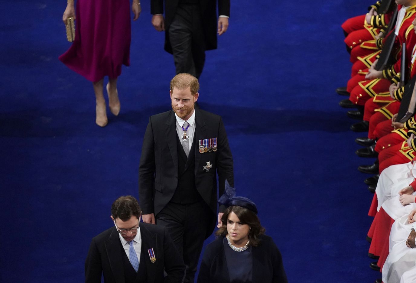 Prince Harry, William's brother, enters Westminster Abbey. <a href='https://www.cnn.com/uk/live-news/king-charles-iii-coronation-ckc-intl-gbr/h_d46a1c2f25cd5c5ed888c323a5411ae9' target='_blank'>He accepted the invitation to his father's coronation</a> but was without his wife, Meghan, who stayed back in California with the couple's two children.