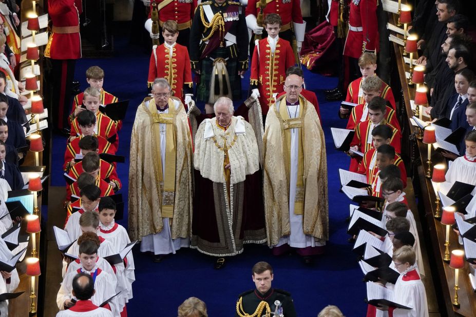 The King arrives at Westminster Abbey for his coronation.