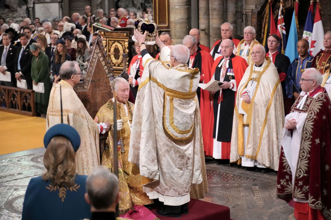 King Charles III sits as he receives The St Edward's Crown during the coronation ceremony at Westminster Abbey, London, Saturday, May 6, 2023. (Jonathan Brady/Pool Photo via AP)