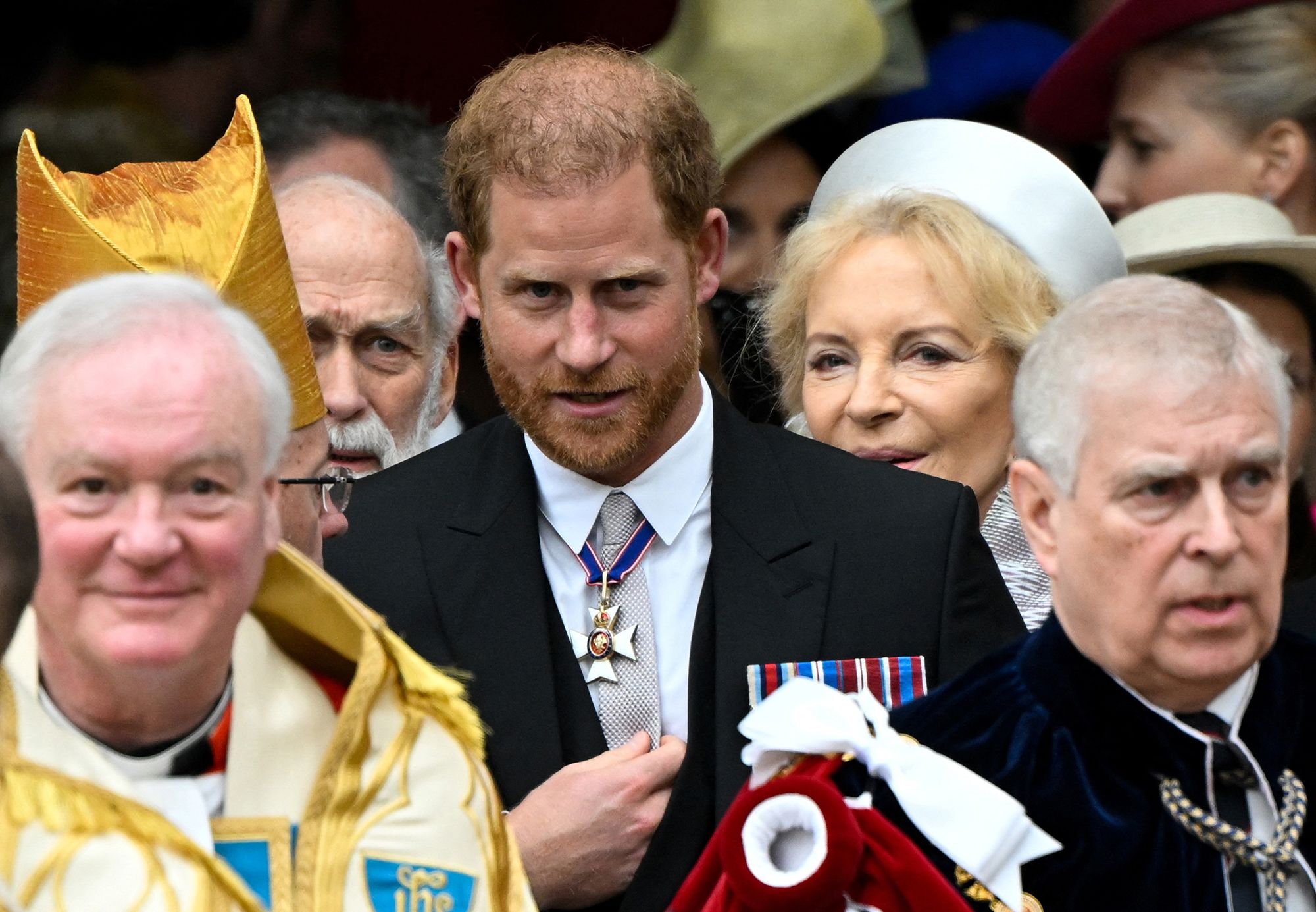 Prince Harry leaves Westminster Abbey after the ceremony.