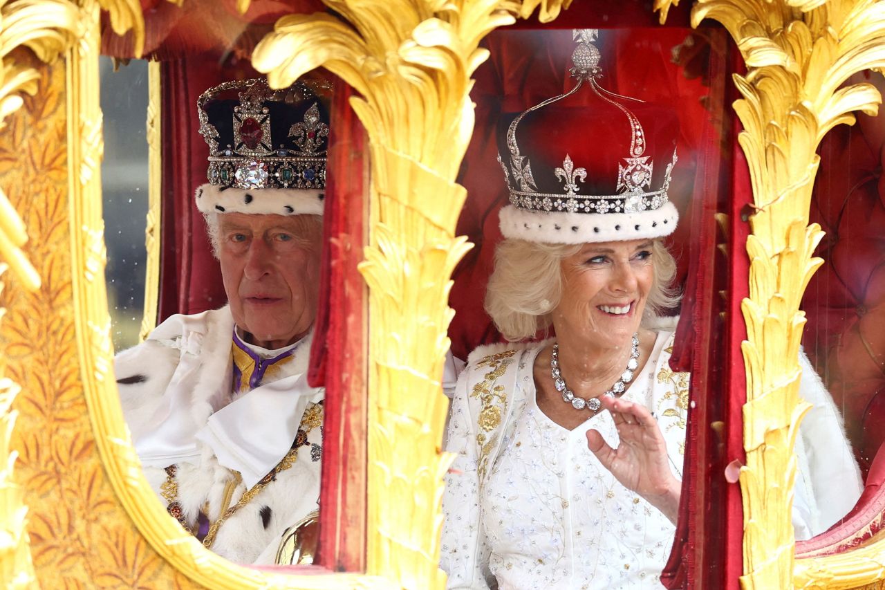 After the coronation, the King and Queen Camilla travel back to Buckingham Palace in the Gold State Coach.