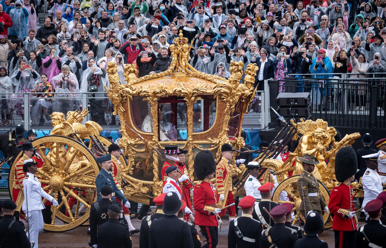 The King and Queen travel to Buckingham Palace in the Gold State Coach after the ceremony at Westminster Abbey.