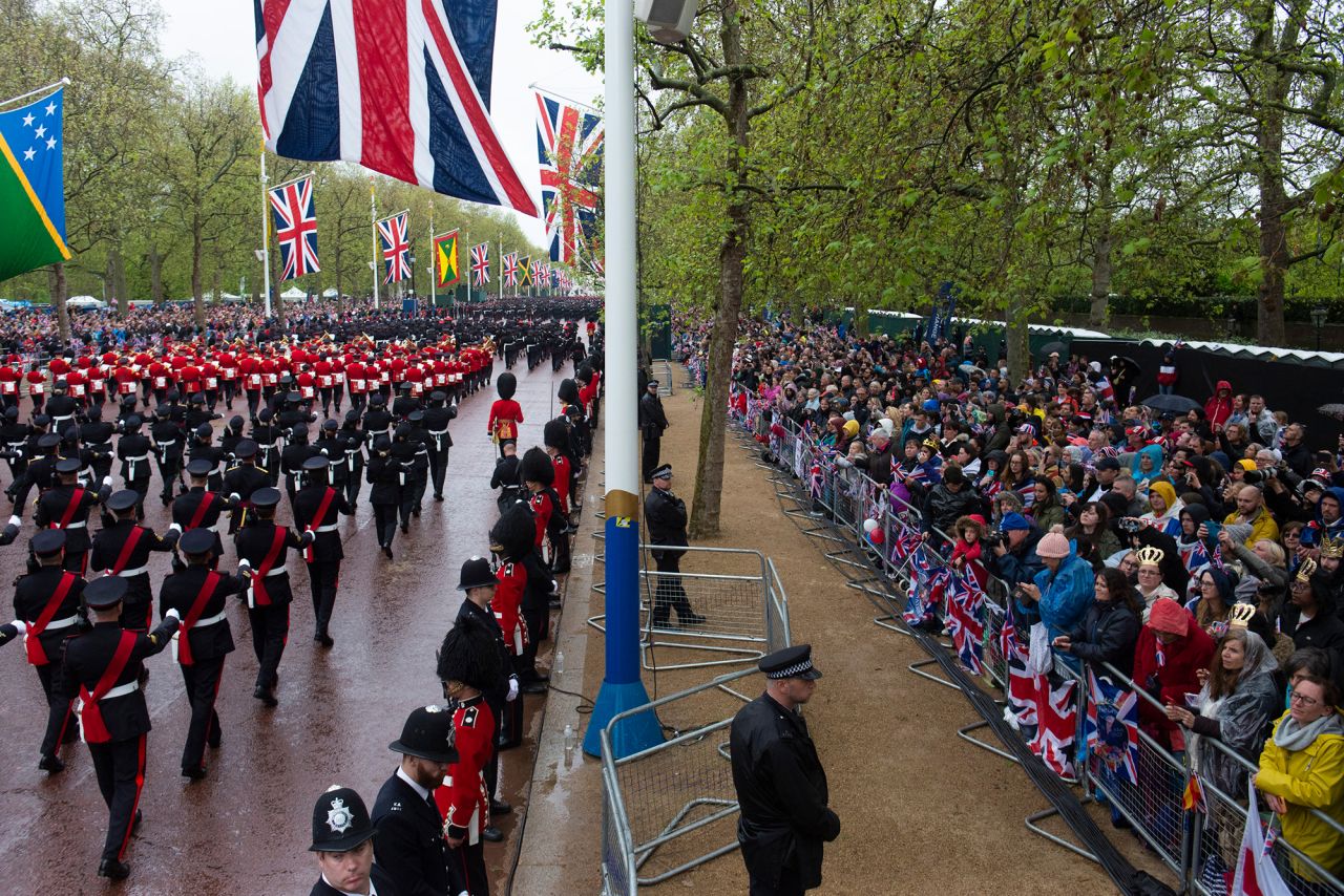 Military groups take part in the parade from Westminster Abbey to Buckingham Palace.