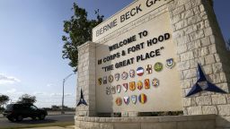 FILE - In this July 9, 2013, file photo, traffic flows through the main gate past a welcome sign in Fort Hood, Texas.