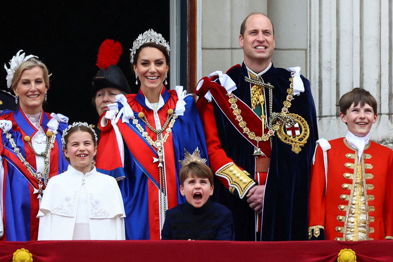 Some members of the royal family appear on the palace balcony after the coronation. From left are Sophie, Duchess of Edinburgh; Princess Charlotte; Princess Anne; Catherine, Princess of Wales; Prince Louis; Prince William; and Oliver Cholmondeley.