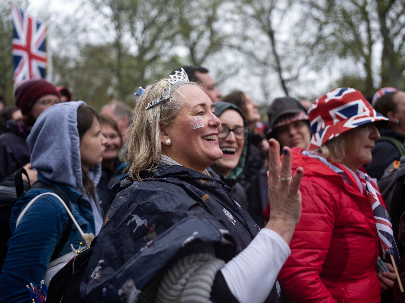 Carol, from Cheshire in northern England, waves along the procession route. "It's been amazing," she said. "An absolutely historic amazing day."