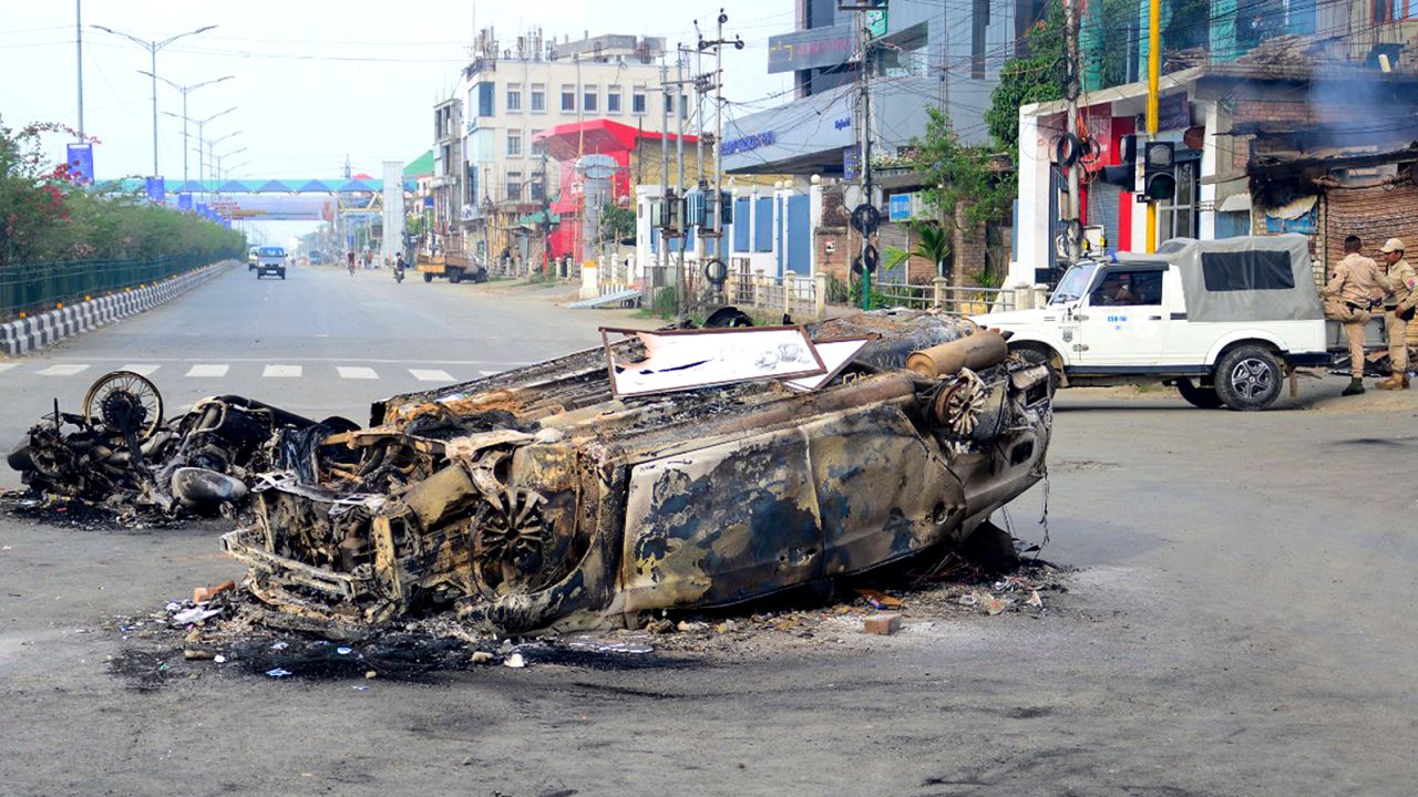 A vehicle set on fire during an outbreak of ethnic violence in Imphal, the capital of India's Manipur state, on May 4. 