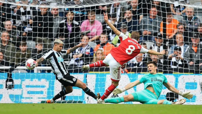NextImg:Arsenal keeps slim Premier League title hopes alive with crucial victory against Newcastle | CNN